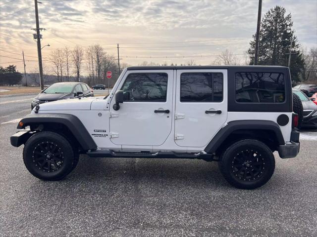 used 2012 Jeep Wrangler Unlimited car, priced at $10,999