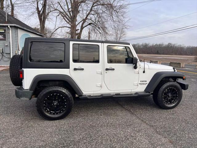 used 2012 Jeep Wrangler Unlimited car, priced at $10,999