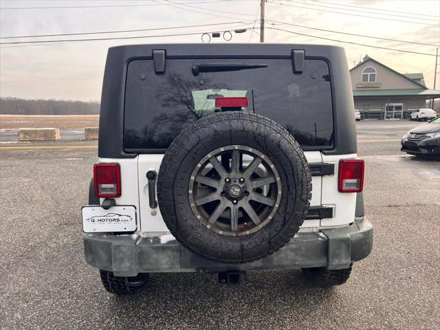 used 2012 Jeep Wrangler Unlimited car, priced at $10,999