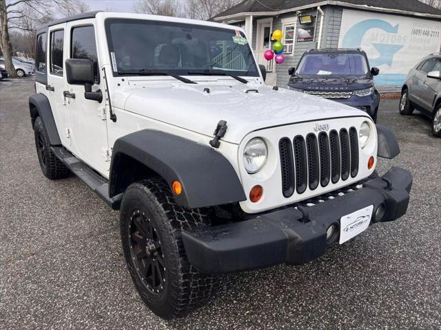 used 2012 Jeep Wrangler Unlimited car, priced at $10,999