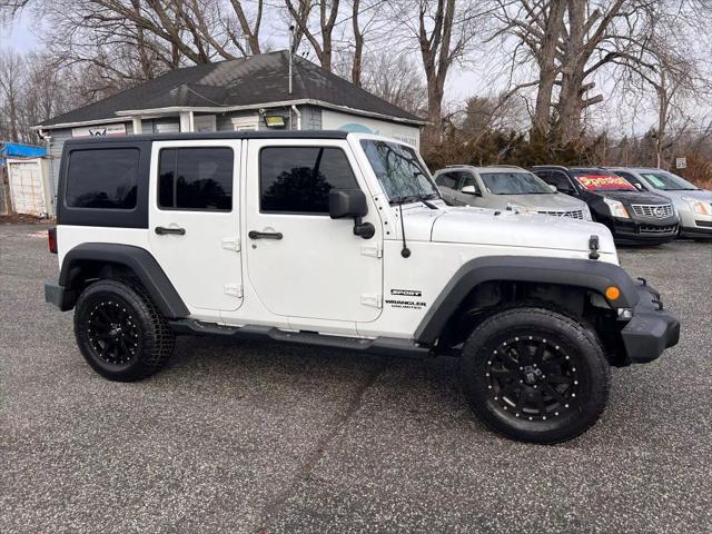 used 2012 Jeep Wrangler Unlimited car, priced at $10,999