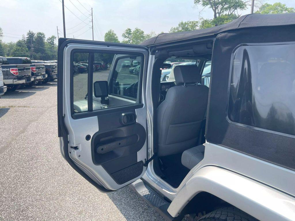 used 2010 Jeep Wrangler Unlimited car, priced at $10,395