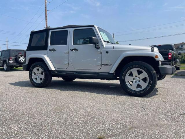 used 2010 Jeep Wrangler Unlimited car, priced at $10,695
