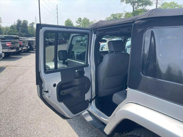 used 2010 Jeep Wrangler Unlimited car, priced at $10,695