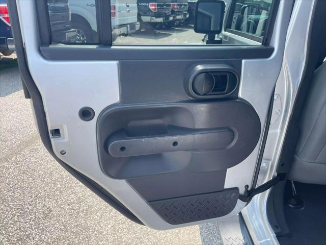 used 2010 Jeep Wrangler Unlimited car, priced at $10,695