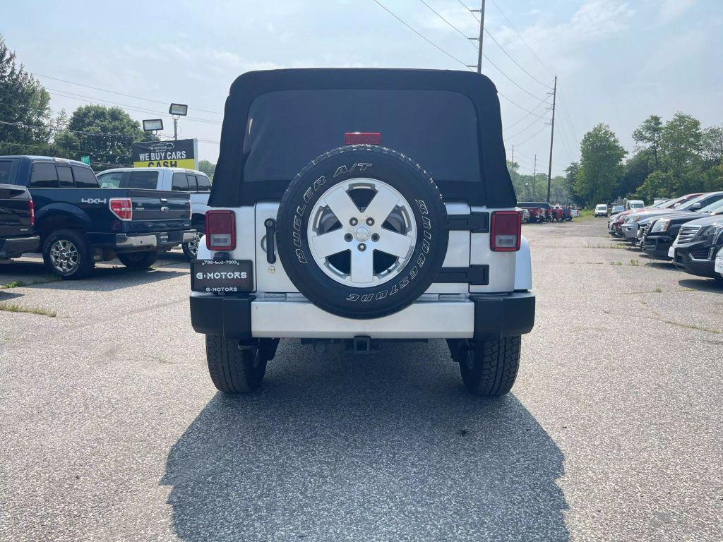 used 2010 Jeep Wrangler Unlimited car, priced at $10,395