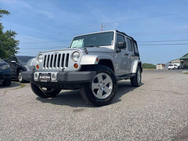 used 2010 Jeep Wrangler Unlimited car, priced at $10,695