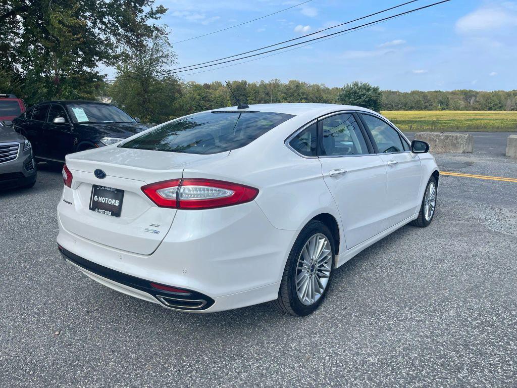 used 2016 Ford Fusion car, priced at $8,395
