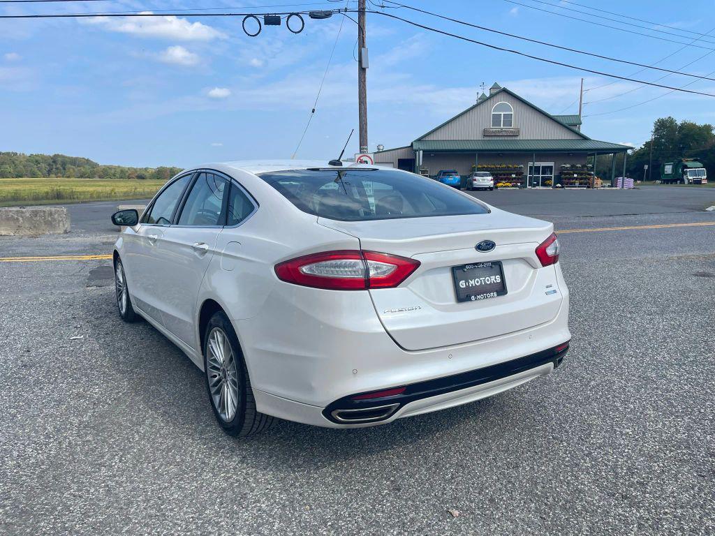 used 2016 Ford Fusion car, priced at $8,395