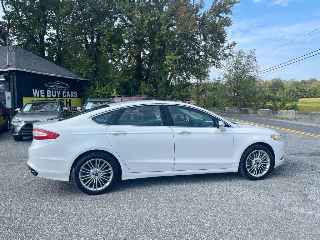 used 2016 Ford Fusion car, priced at $8,395