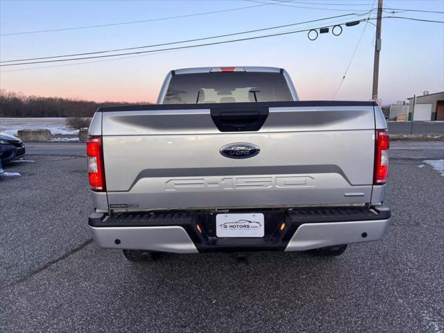 used 2018 Ford F-150 car, priced at $12,999