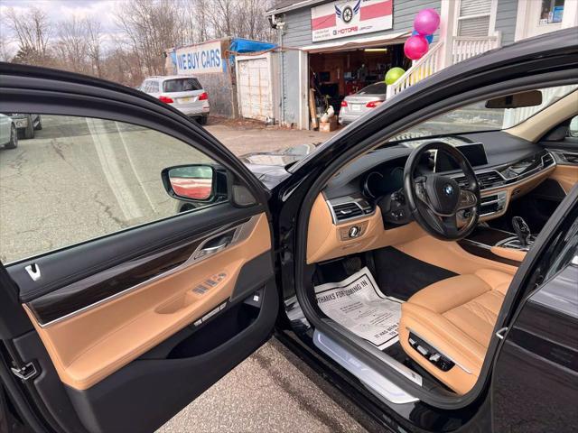 used 2017 BMW 750 car, priced at $17,999