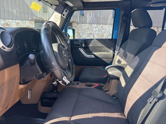 used 2012 Jeep Wrangler Unlimited car, priced at $13,999