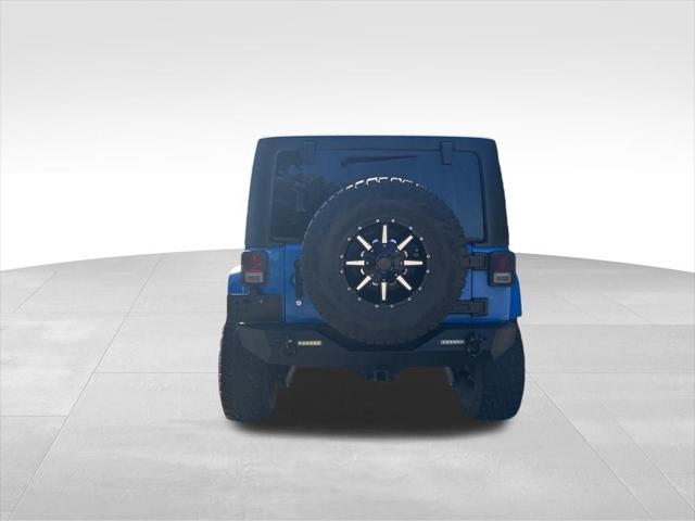 used 2012 Jeep Wrangler Unlimited car, priced at $13,999