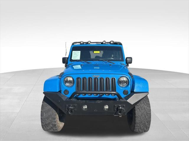 used 2012 Jeep Wrangler Unlimited car, priced at $13,999