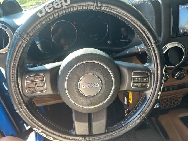 used 2012 Jeep Wrangler Unlimited car, priced at $13,999