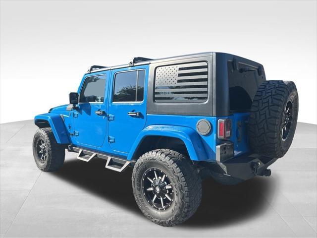 used 2012 Jeep Wrangler Unlimited car, priced at $13,999