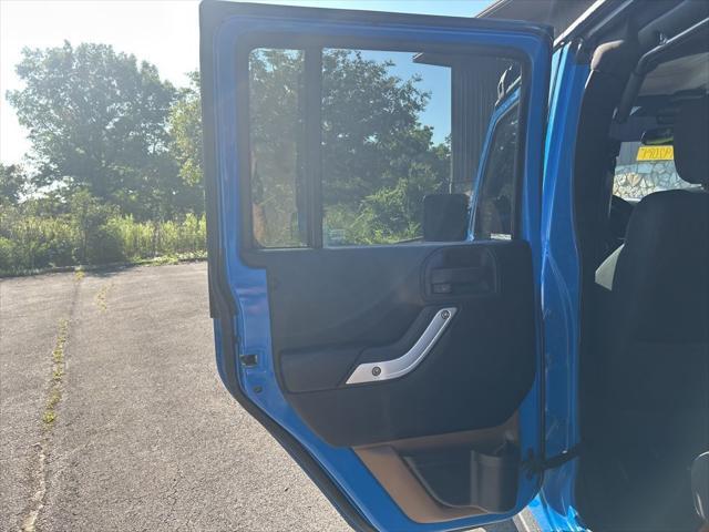used 2012 Jeep Wrangler Unlimited car, priced at $13,999