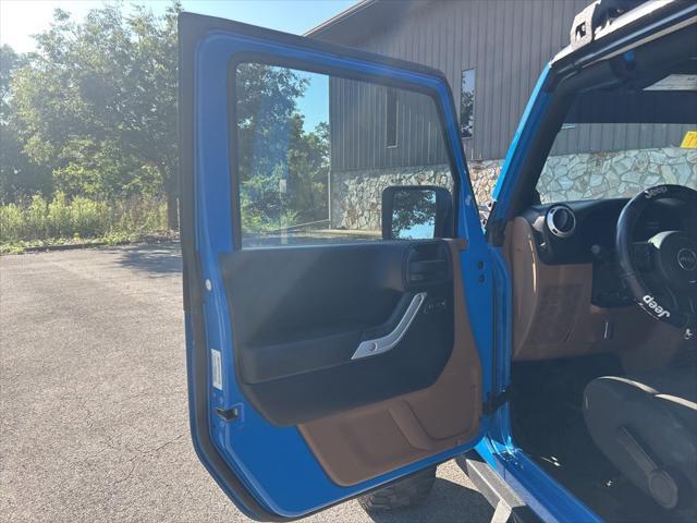 used 2012 Jeep Wrangler Unlimited car, priced at $13,999