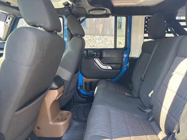 used 2012 Jeep Wrangler Unlimited car, priced at $13,999