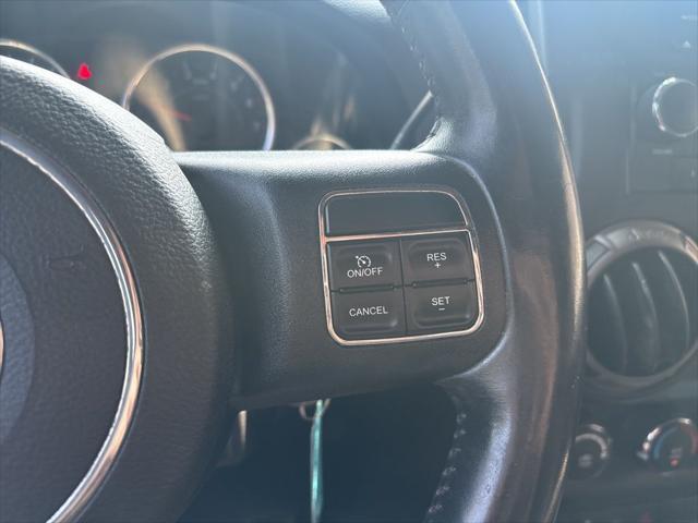 used 2012 Jeep Wrangler Unlimited car, priced at $14,999