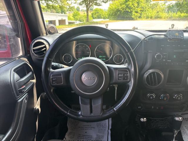 used 2012 Jeep Wrangler Unlimited car, priced at $14,999