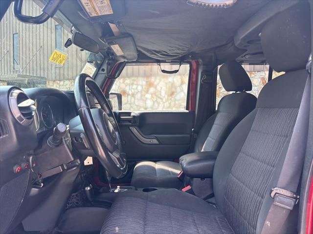 used 2012 Jeep Wrangler Unlimited car, priced at $14,999