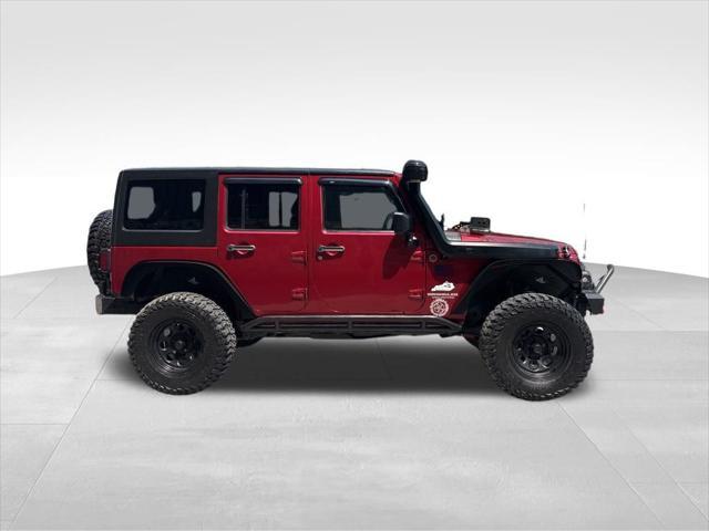 used 2012 Jeep Wrangler Unlimited car, priced at $14,999