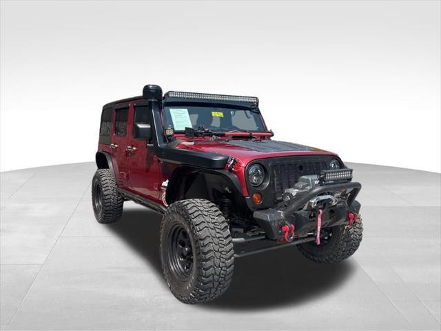 used 2012 Jeep Wrangler Unlimited car, priced at $14,999