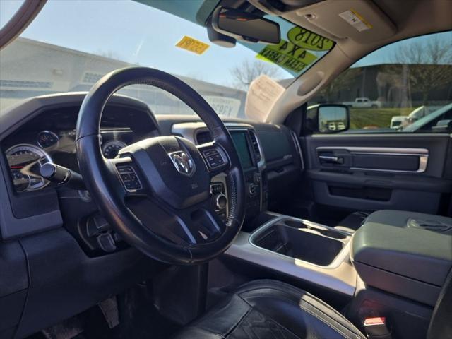 used 2018 Ram 1500 car, priced at $14,400