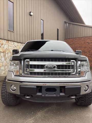 used 2013 Ford F-150 car, priced at $13,999