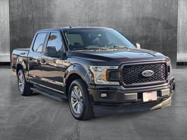 used 2018 Ford F-150 car, priced at $23,595