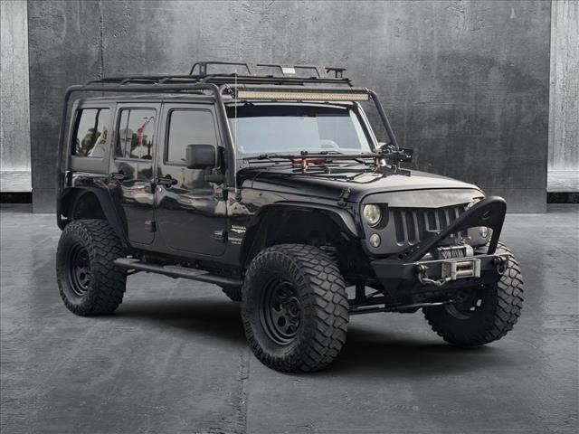 used 2014 Jeep Wrangler Unlimited car, priced at $15,995