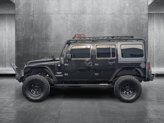 used 2014 Jeep Wrangler Unlimited car, priced at $15,995