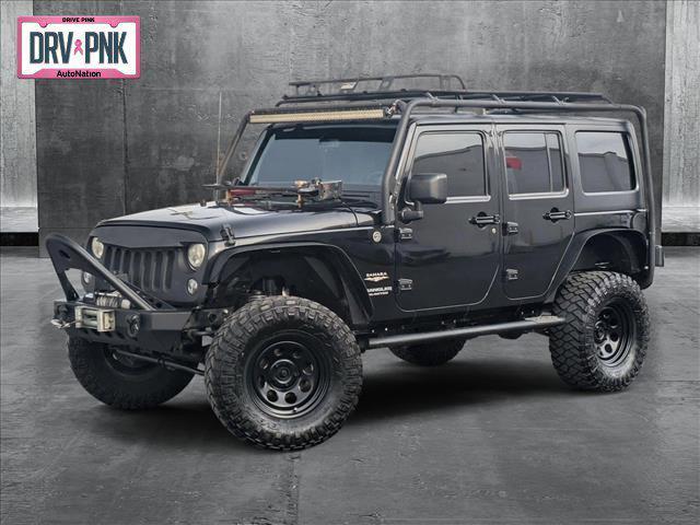 used 2014 Jeep Wrangler Unlimited car, priced at $15,745