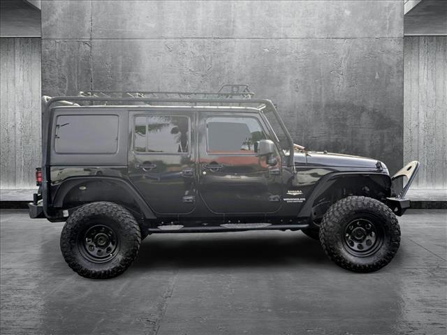 used 2014 Jeep Wrangler Unlimited car, priced at $15,995