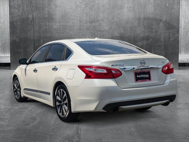 used 2016 Nissan Altima car, priced at $9,500