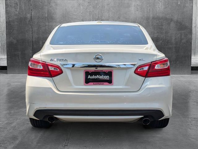 used 2016 Nissan Altima car, priced at $9,500