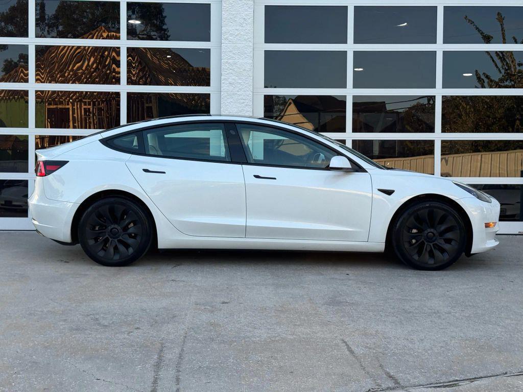 used 2023 Tesla Model 3 car, priced at $24,950