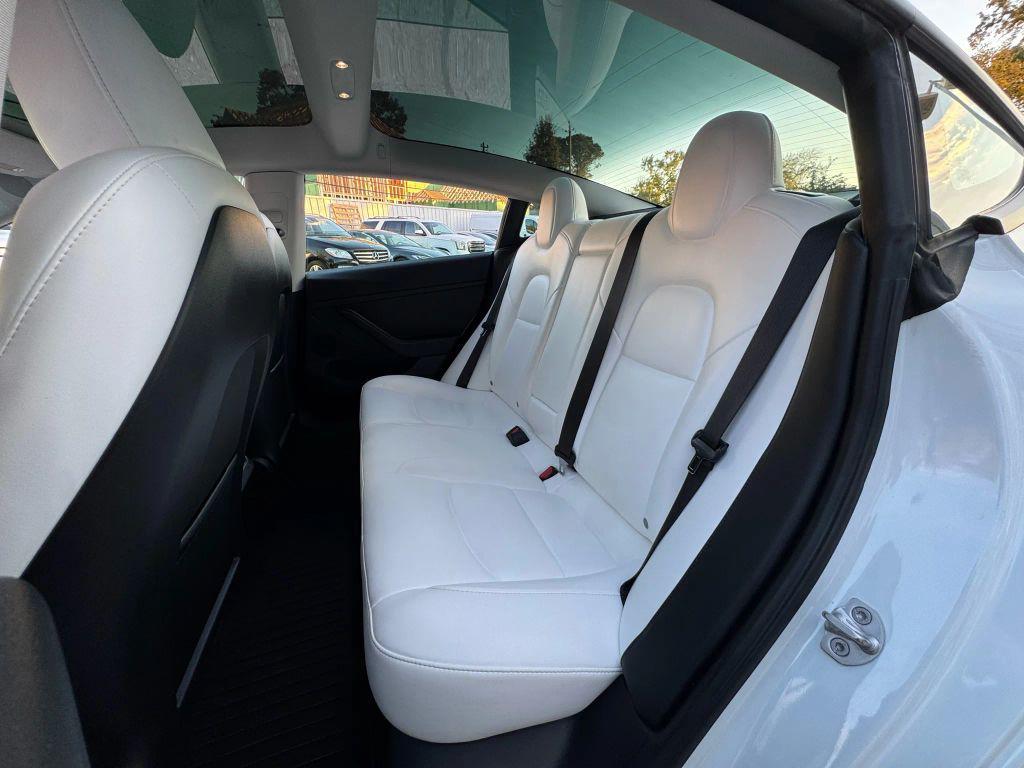 used 2023 Tesla Model 3 car, priced at $24,950
