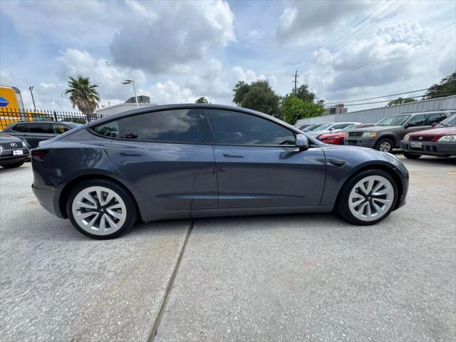 used 2022 Tesla Model 3 car, priced at $26,750