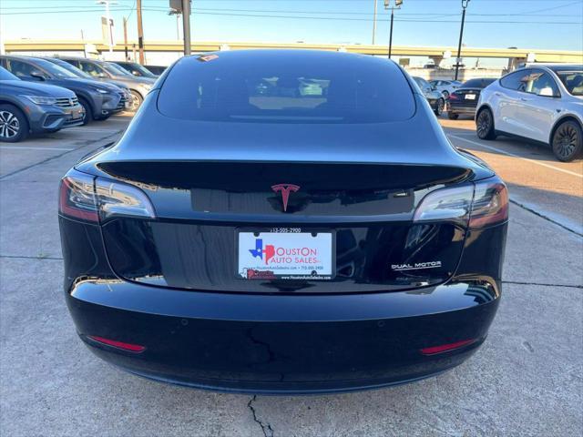 used 2022 Tesla Model 3 car, priced at $26,950