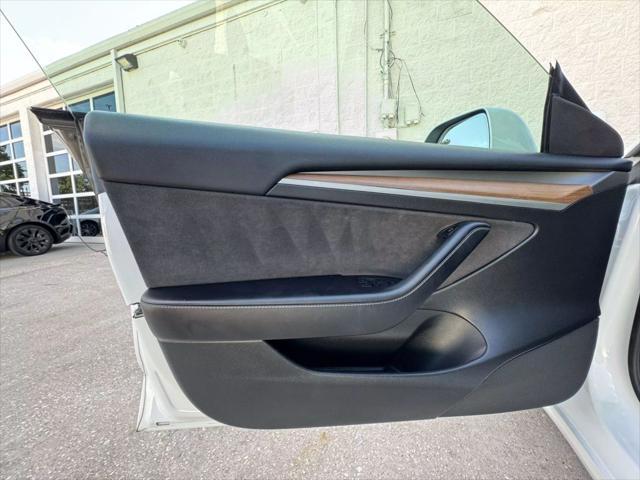 used 2022 Tesla Model 3 car, priced at $26,750