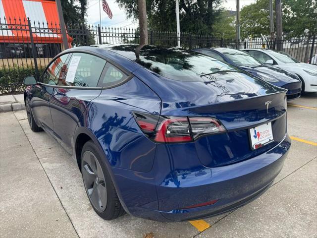 used 2023 Tesla Model 3 car, priced at $26,750