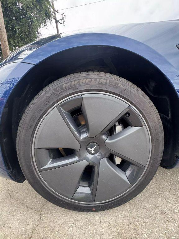used 2023 Tesla Model 3 car, priced at $26,750