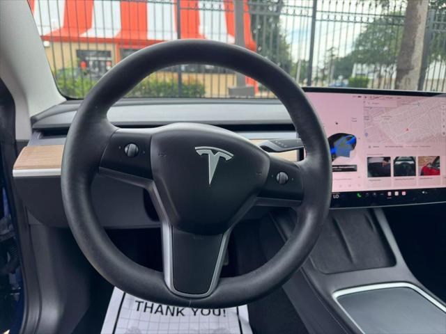 used 2023 Tesla Model 3 car, priced at $26,750