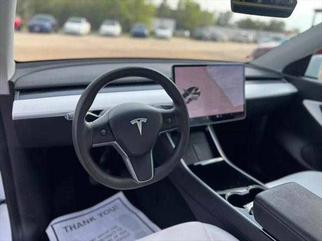 used 2021 Tesla Model Y car, priced at $27,950