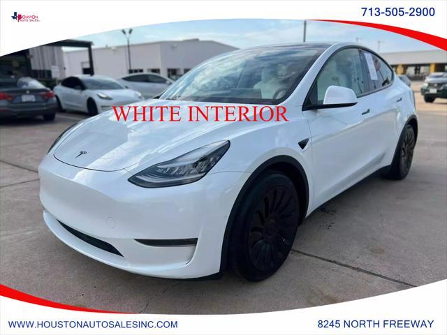 used 2021 Tesla Model Y car, priced at $27,950