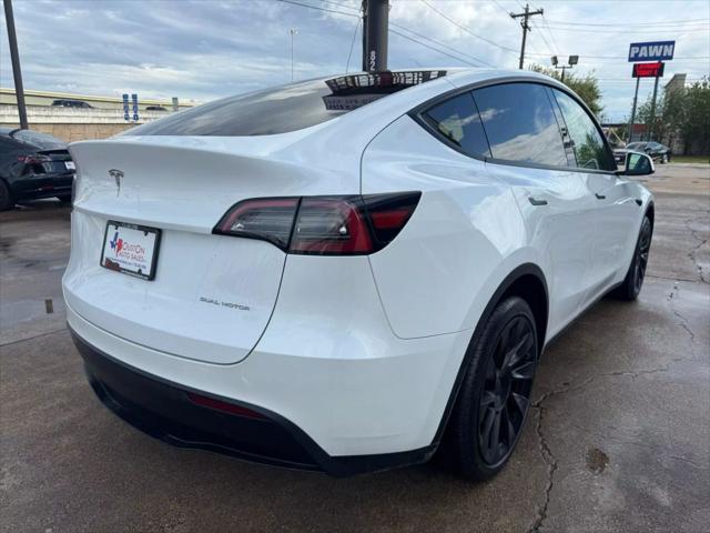 used 2023 Tesla Model Y car, priced at $29,750