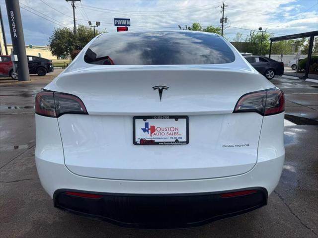 used 2023 Tesla Model Y car, priced at $29,750